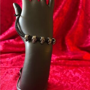J125 NWOT Skull Charm Bracelet in Black and Gunmetal Silver